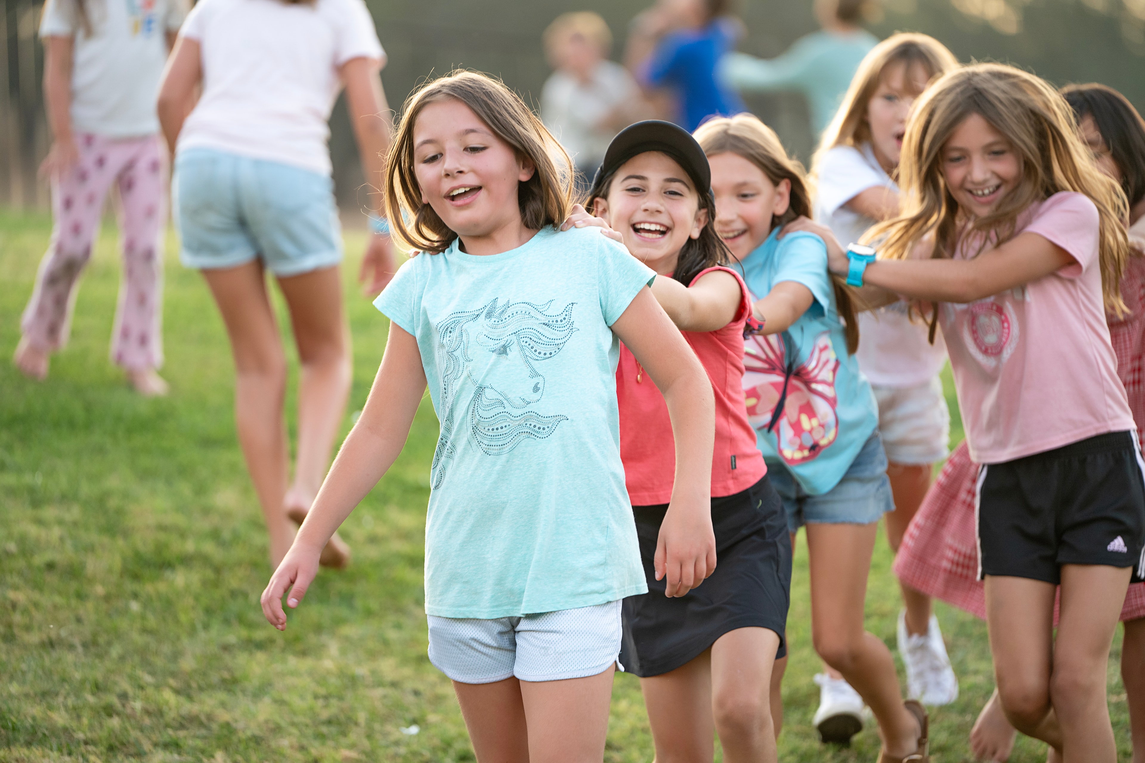 Children playing together outside at church