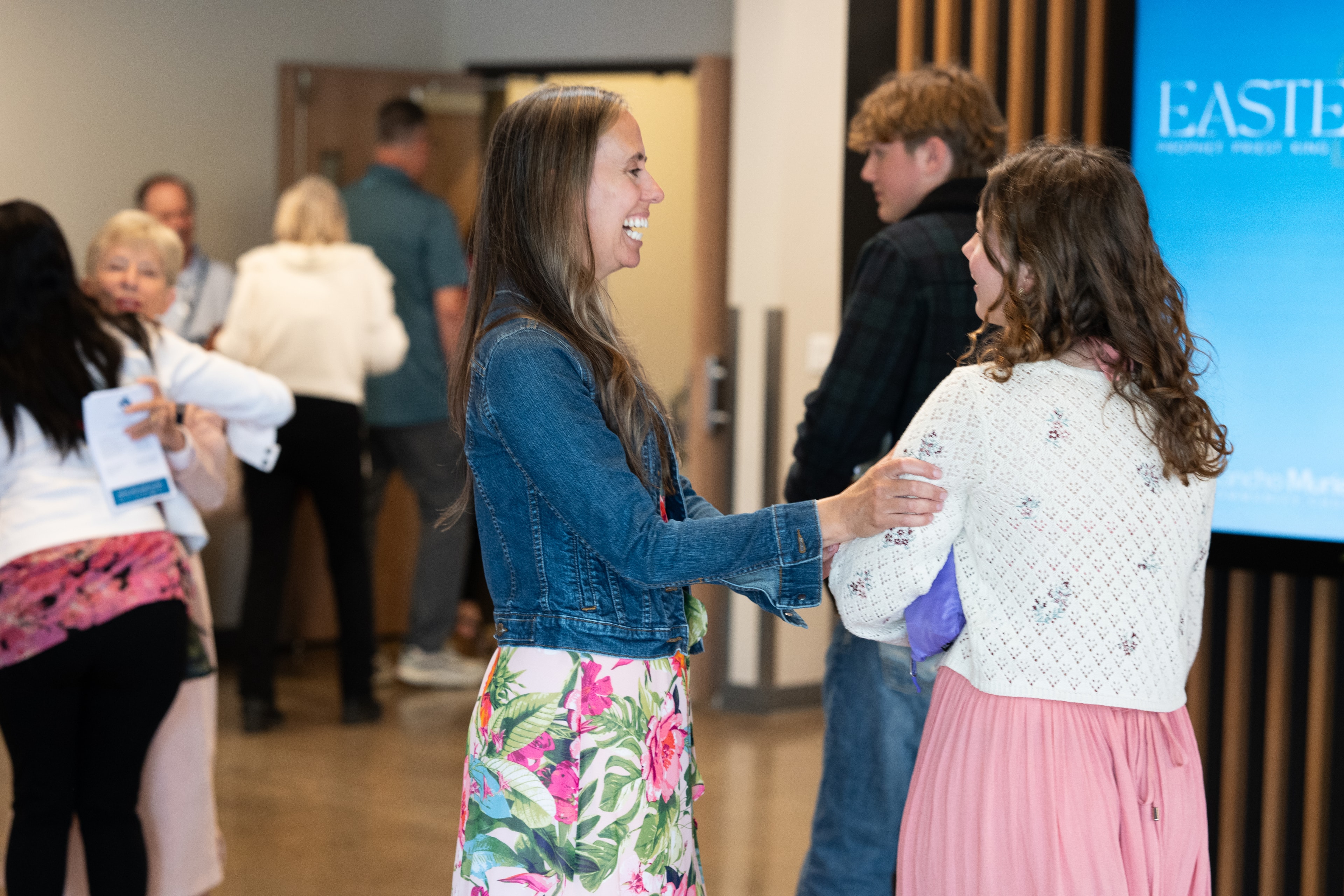 Church members connecting in the lobby